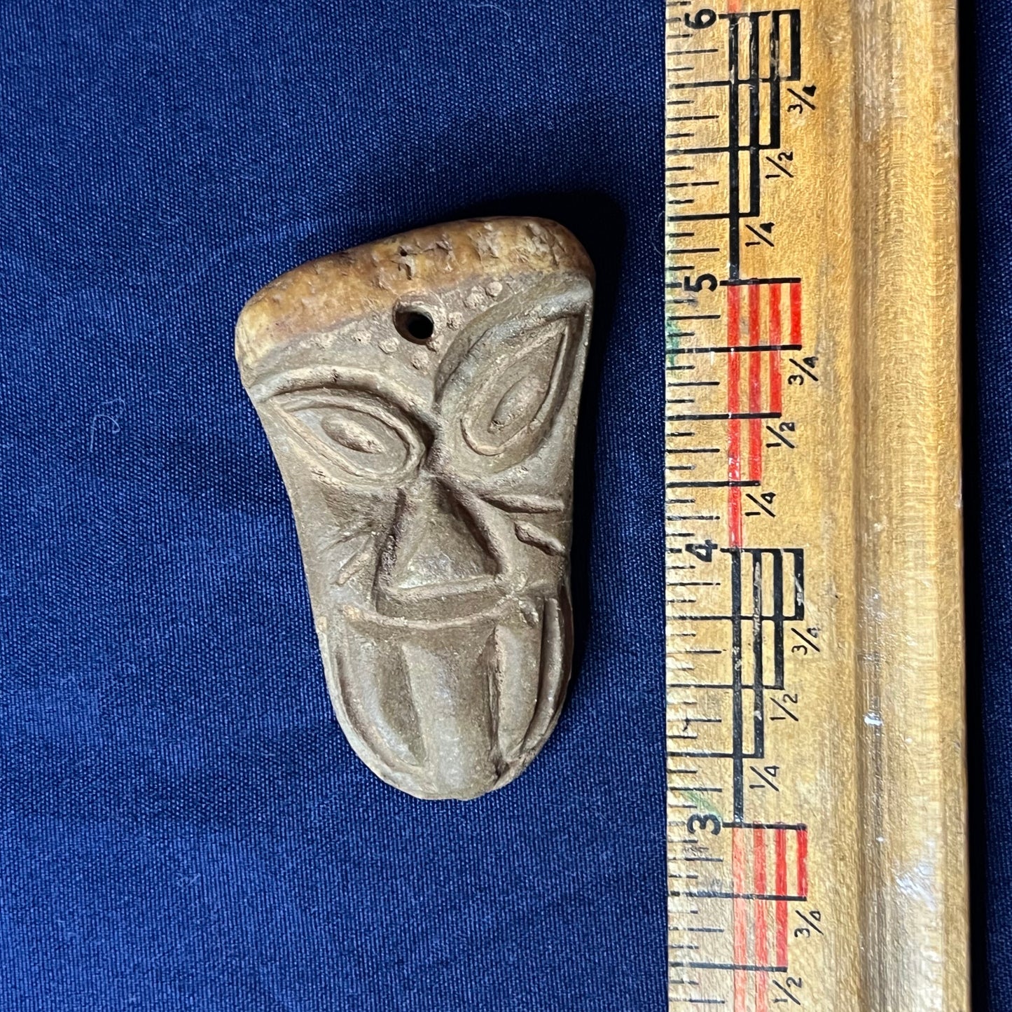 Mayan effigy of a carved face