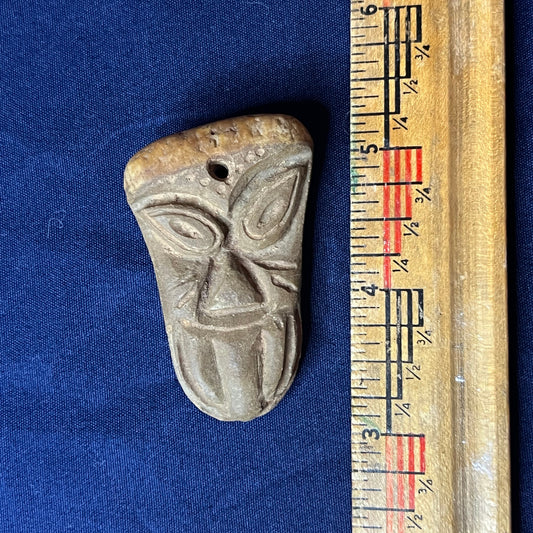 Mayan effigy of a carved face